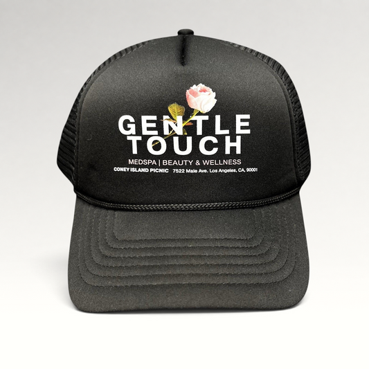 Raree Finds black foam trucker hat with Gentle Touch MedSpa rose graphic and adjustable snapback closure
