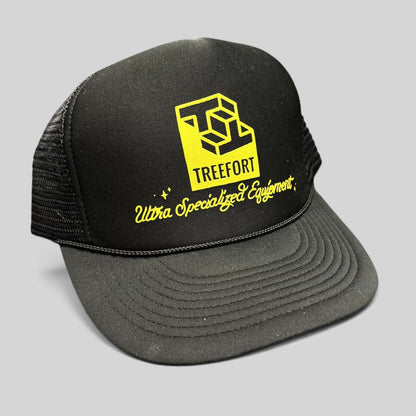 Raree Finds black trucker hat with yellow Treefort Ultra Specialized Equipment graphic and braided brim rope detail.