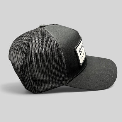 Raree Finds black Rodeo Country Club trucker hat with breathable mesh back and embroidered front patch