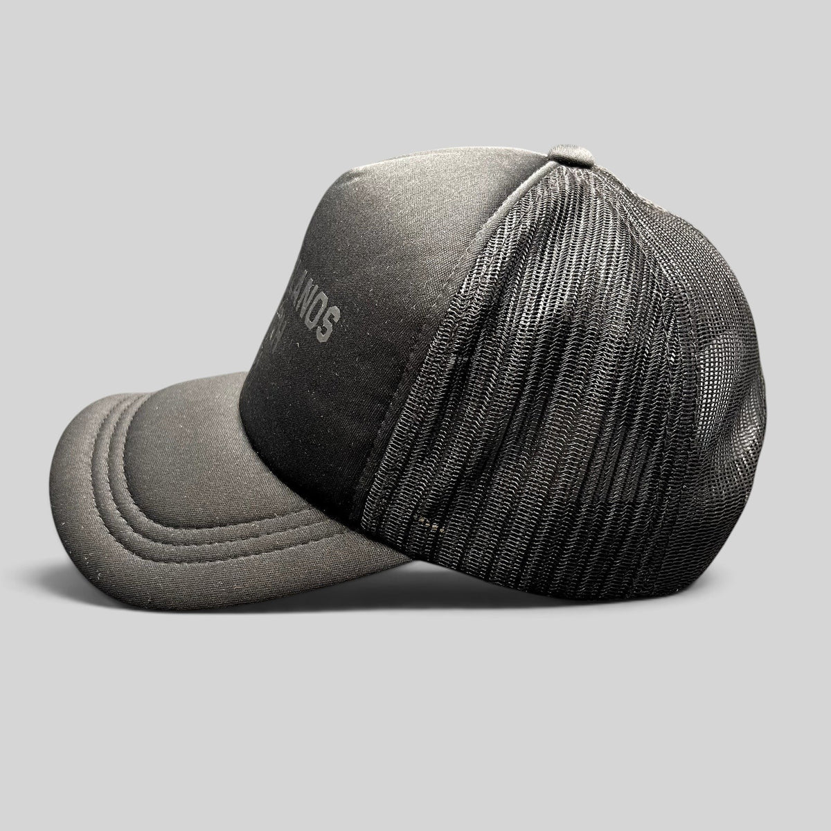 Raree Finds black Los Poblanos Ranch 1934 trucker hat with foam front, mesh back panels, and adjustable snapback closure