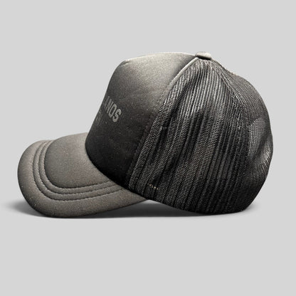 Raree Finds black Los Poblanos Ranch 1934 trucker hat with foam front, mesh back panels, and adjustable snapback closure