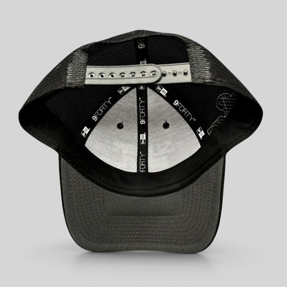 Raree Finds black New Era 9FORTY trucker snapback hat interior view showing mesh back and adjustable strap