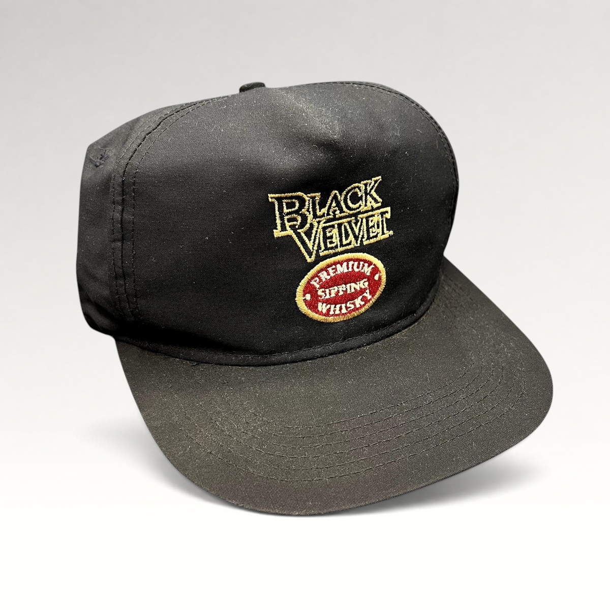 Raree Finds vintage Black Velvet Premium Blended Canadian Whisky black snapback hat with embroidered logo and crest