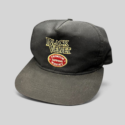 Raree Finds vintage black snapback hat with embroidered Black Velvet Premium Blended Whisky logo and red crest