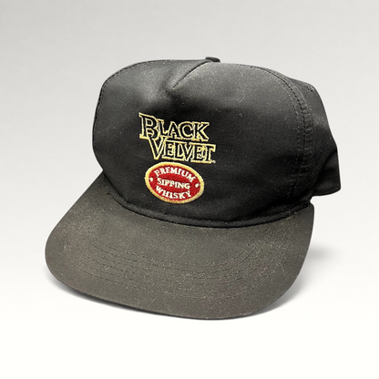 Raree Finds vintage black snapback hat with embroidered Black Velvet Premium Sipping Whisky logo and red crest