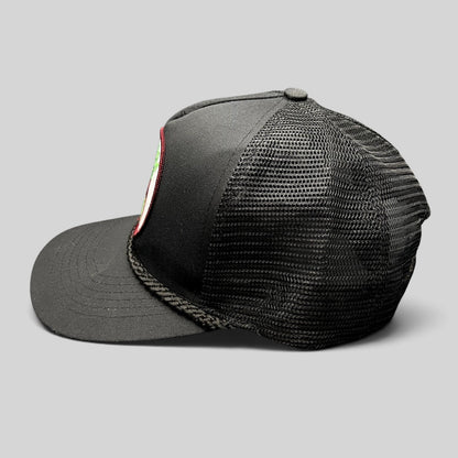 Raree Finds vintage black Calistoga Wine trucker hat with mesh back, braided rope brim, and embroidered grape patch.