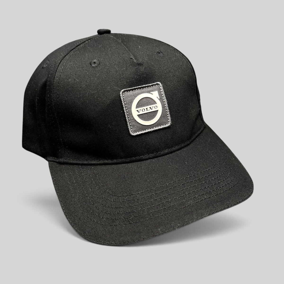 Raree Finds black organic cotton Volvo baseball cap with a raised rubber Iron Mark logo patch on the front