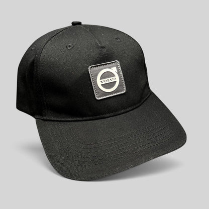 Raree Finds black organic cotton Volvo baseball cap with a raised rubber Iron Mark logo patch on the front