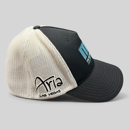 Raree Finds black and white mesh Flexfit golf hat featuring Aria Las Vegas embroidery and MJ Invitational logo