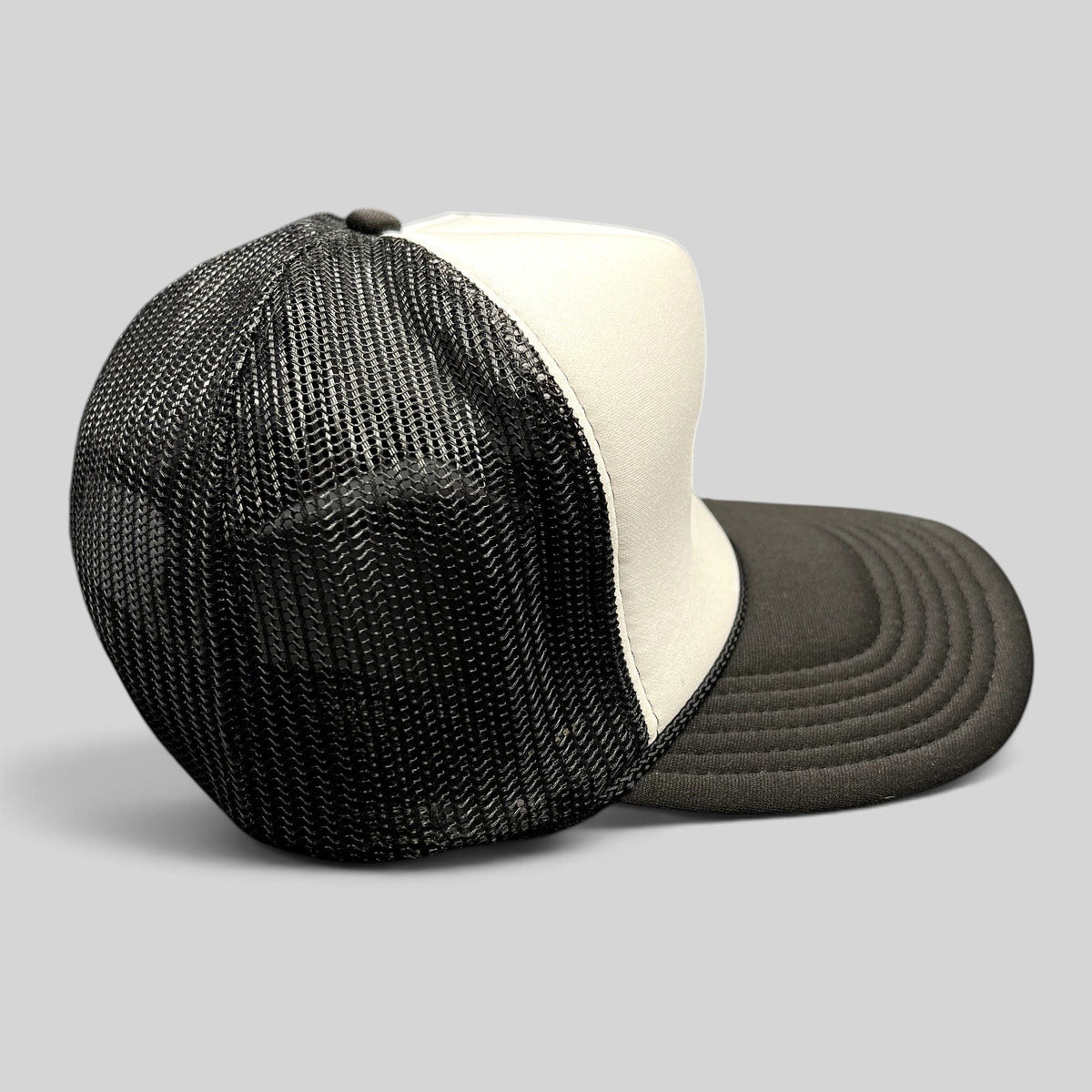 Raree Finds vintage OTTO trucker hat with black mesh back, white foam front, and curved black brim.