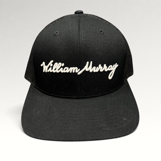 Raree Finds black William Murray Golf trucker hat with white script logo embroidery and structured mesh back
