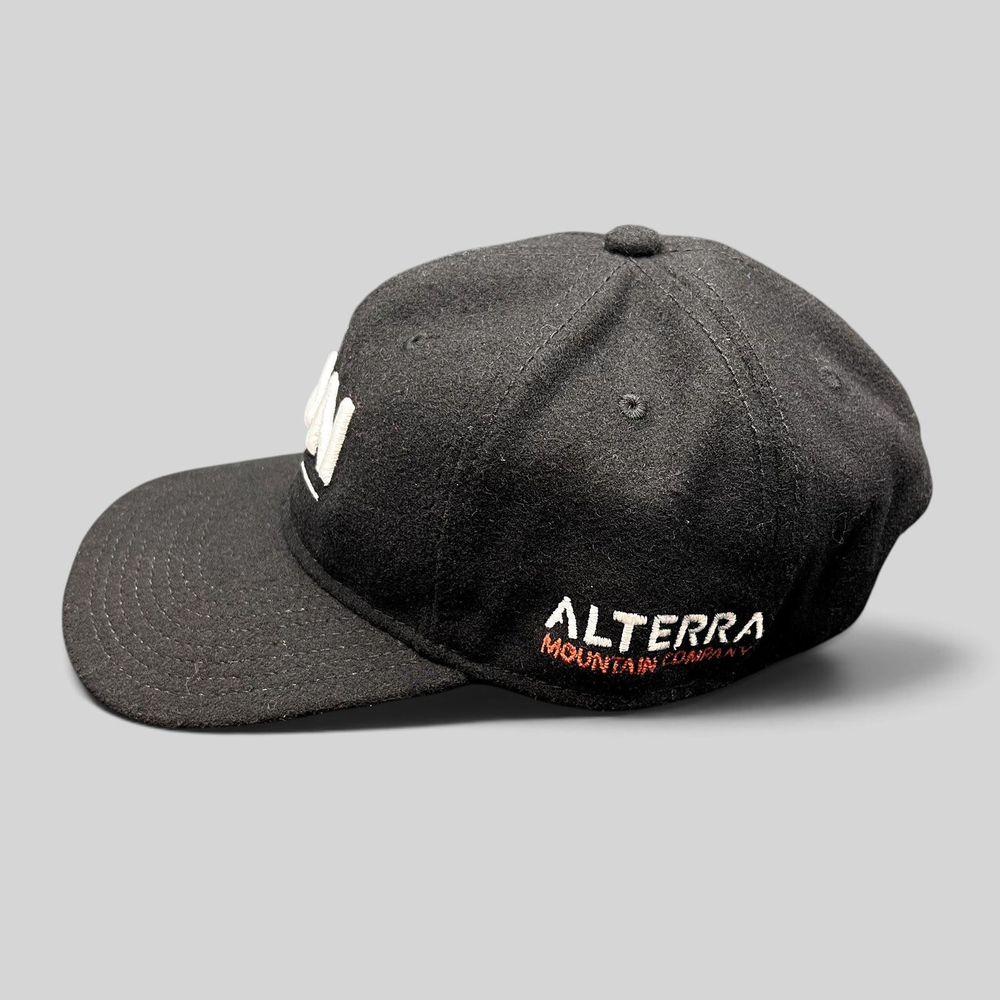 Raree Finds black wool-blend Ikon Pass strapback hat with white Alterra Mountain Company side embroidery