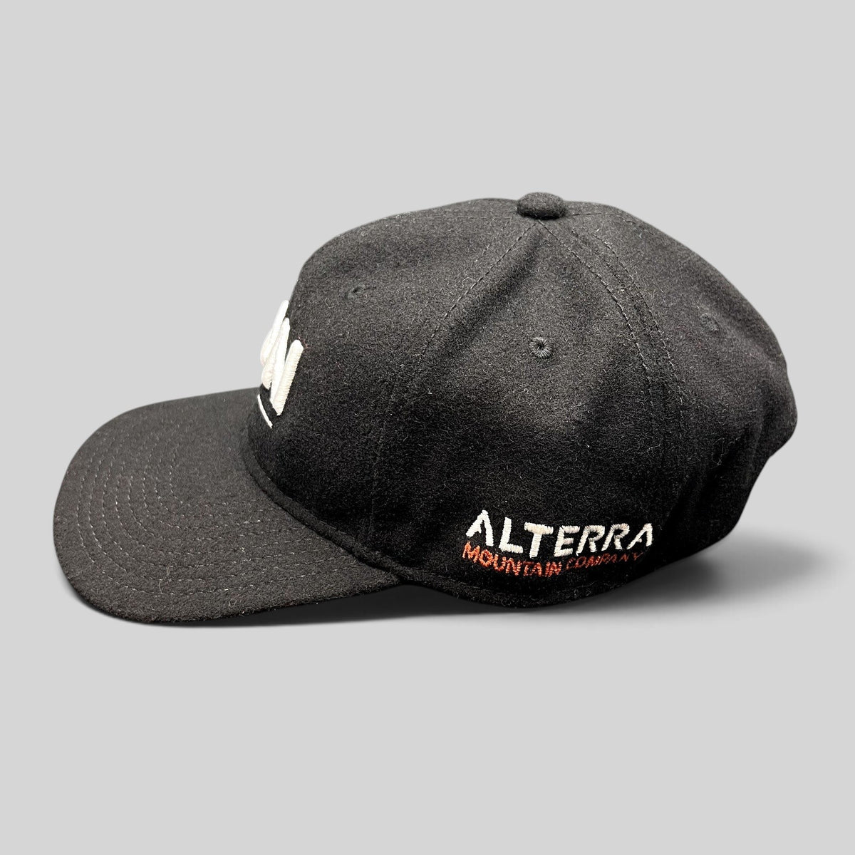 Raree Finds black wool-blend Ikon Pass strapback hat with white Alterra Mountain Company side embroidery