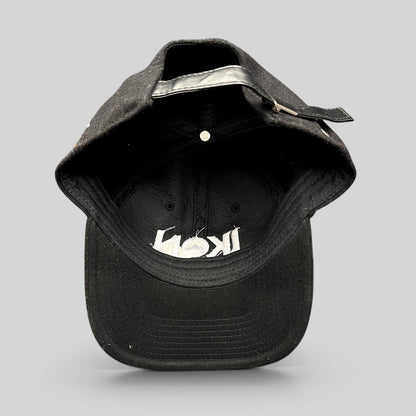 Raree Finds black wool-blend Ikon Pass strapback hat with white embroidered logo and adjustable leather-style strap