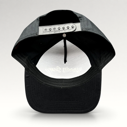Raree Finds black Bloody Gerry snapback hat showing the adjustable plastic snap closure and interior branding