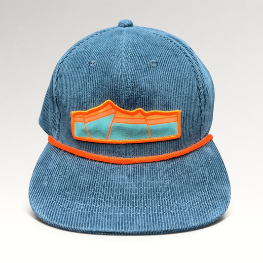 Raree Finds blue corduroy snapback hat with orange rope detail and mountain landscape embroidered patch logo