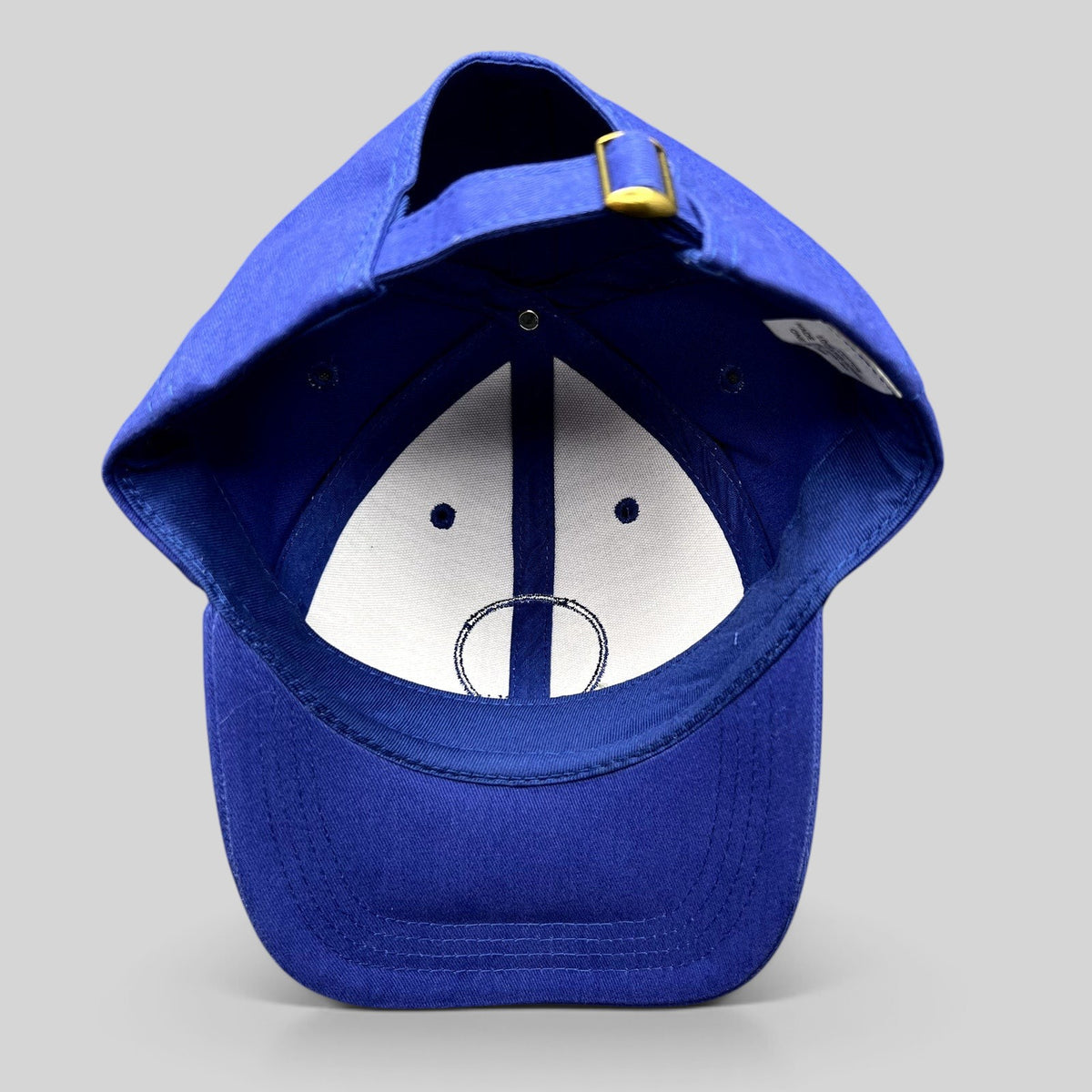 Raree Finds royal blue AT&T Pebble Beach Pro-Am golf hat interior view showing adjustable brass buckle strap