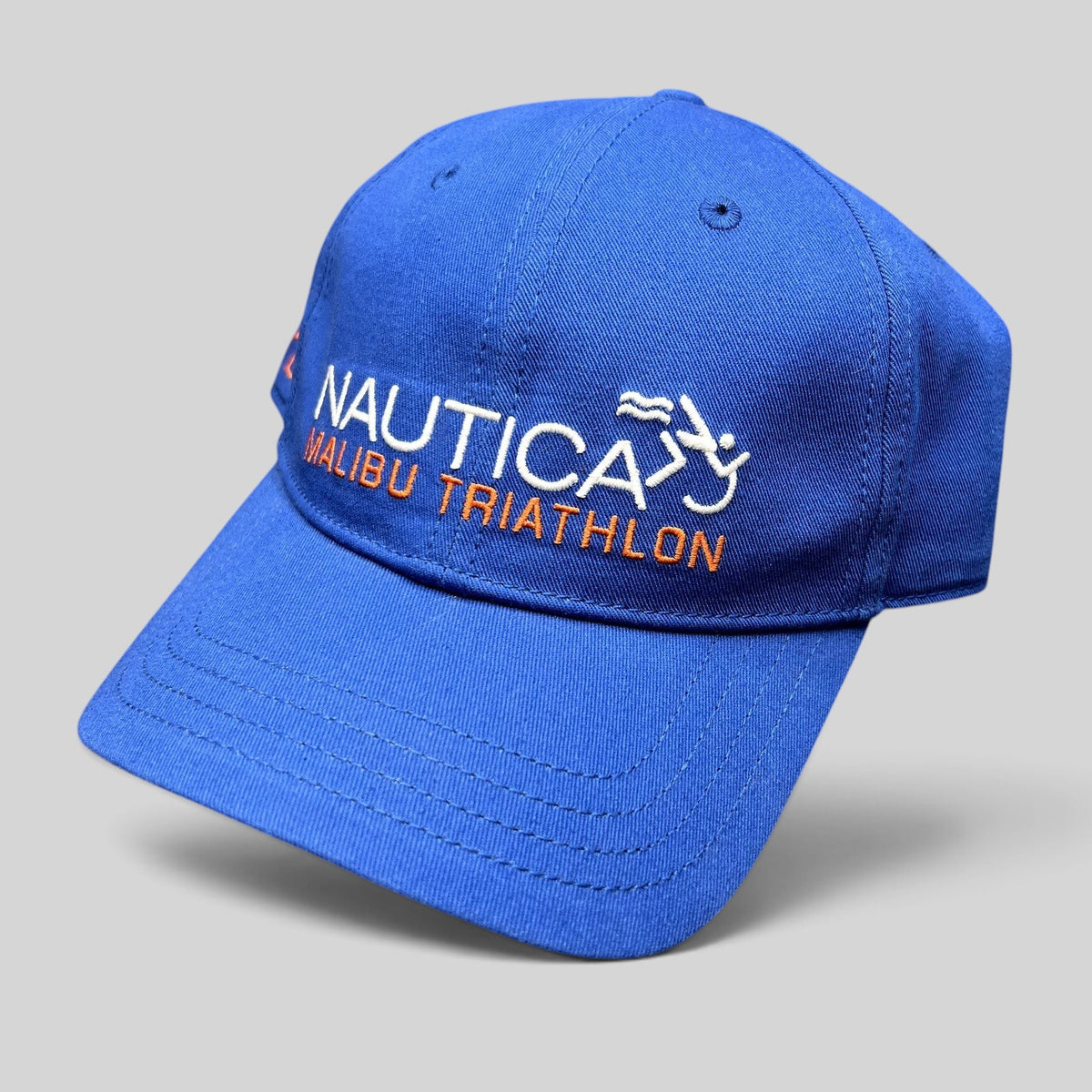 Raree Finds blue cotton Nautica Malibu Triathlon strapback hat with embroidered front logo and pre-curved brim