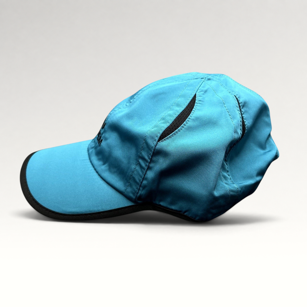 Raree Finds blue lightweight polyester performance running hat with black trim and adjustable strapback closure
