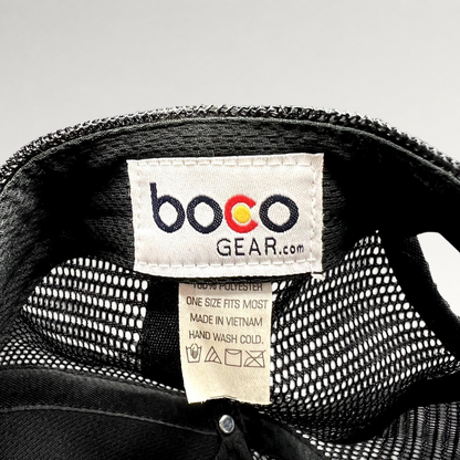 Raree Finds Boco Gear trucker hat interior tag showing brand logo, material composition, and care instructions.