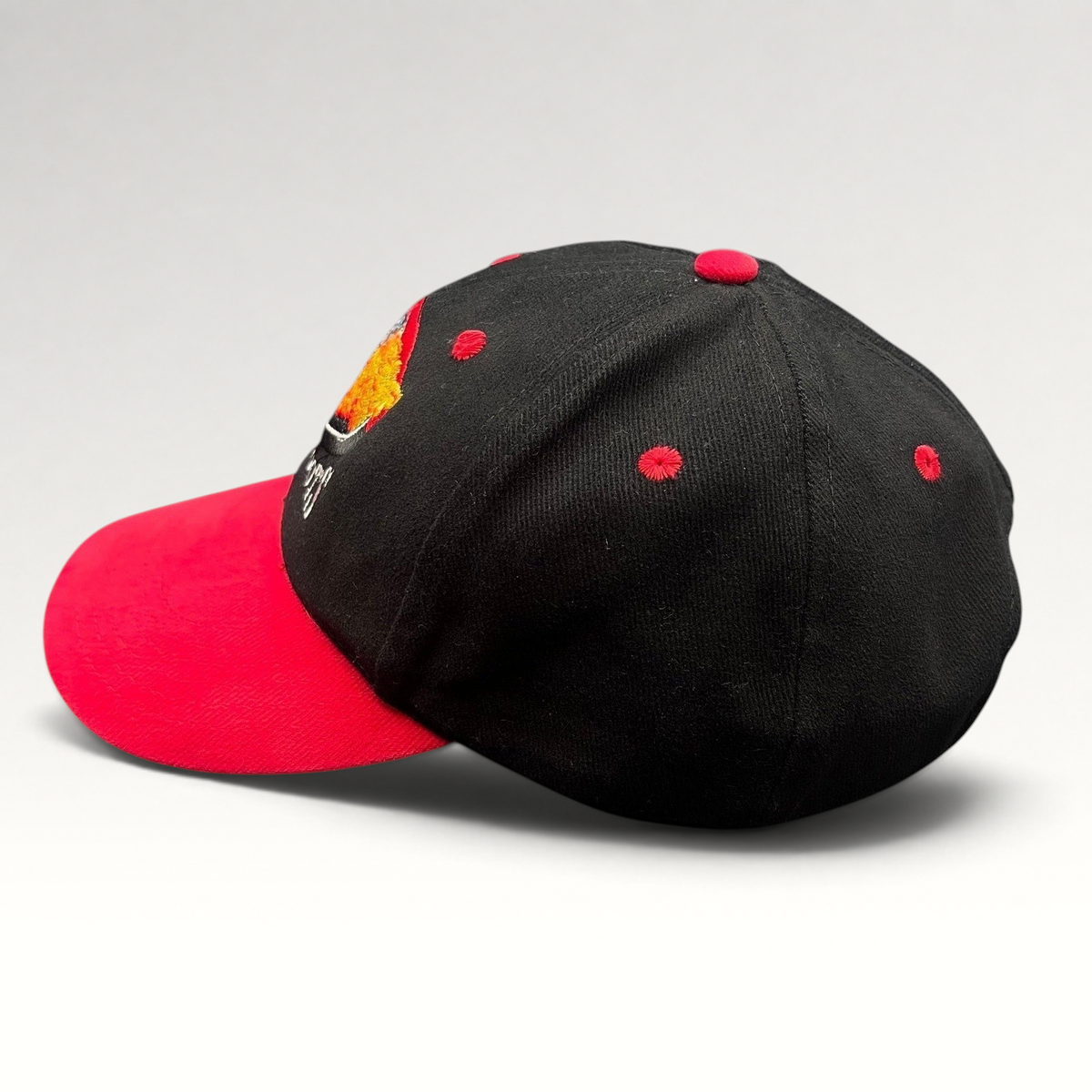 Raree Finds vintage Boots & Coots oilfield firefighter snapback hat with a black crown, red brim, and flame logo.
