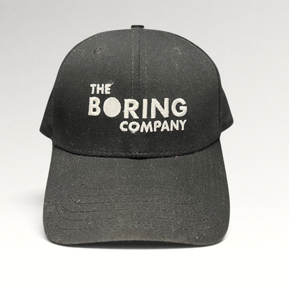 Raree Finds black The Boring Company strapback hat with white embroidered logo on the front