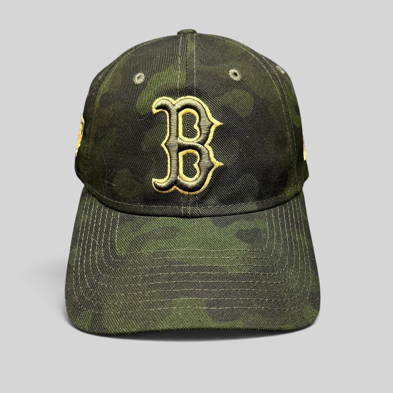 Raree Finds Boston Red Sox New Era 9TWENTY strapback hat in woodland camouflage with black and gold embroidered B logo