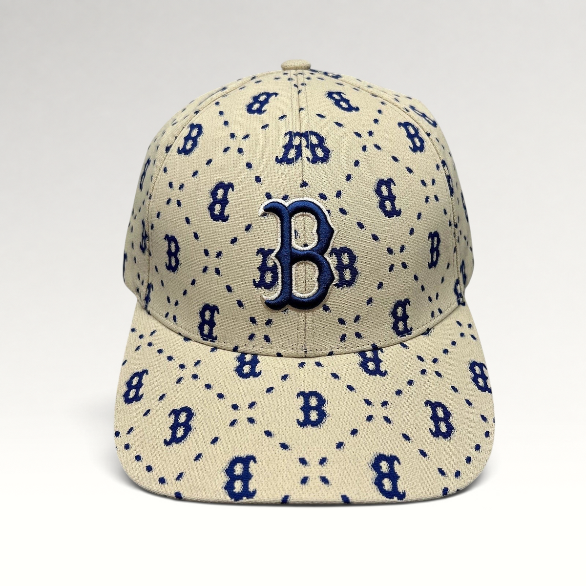 Raree Finds MLB Korea Boston Red Sox strapback hat in beige canvas with a blue monogram B pattern and raised logo.