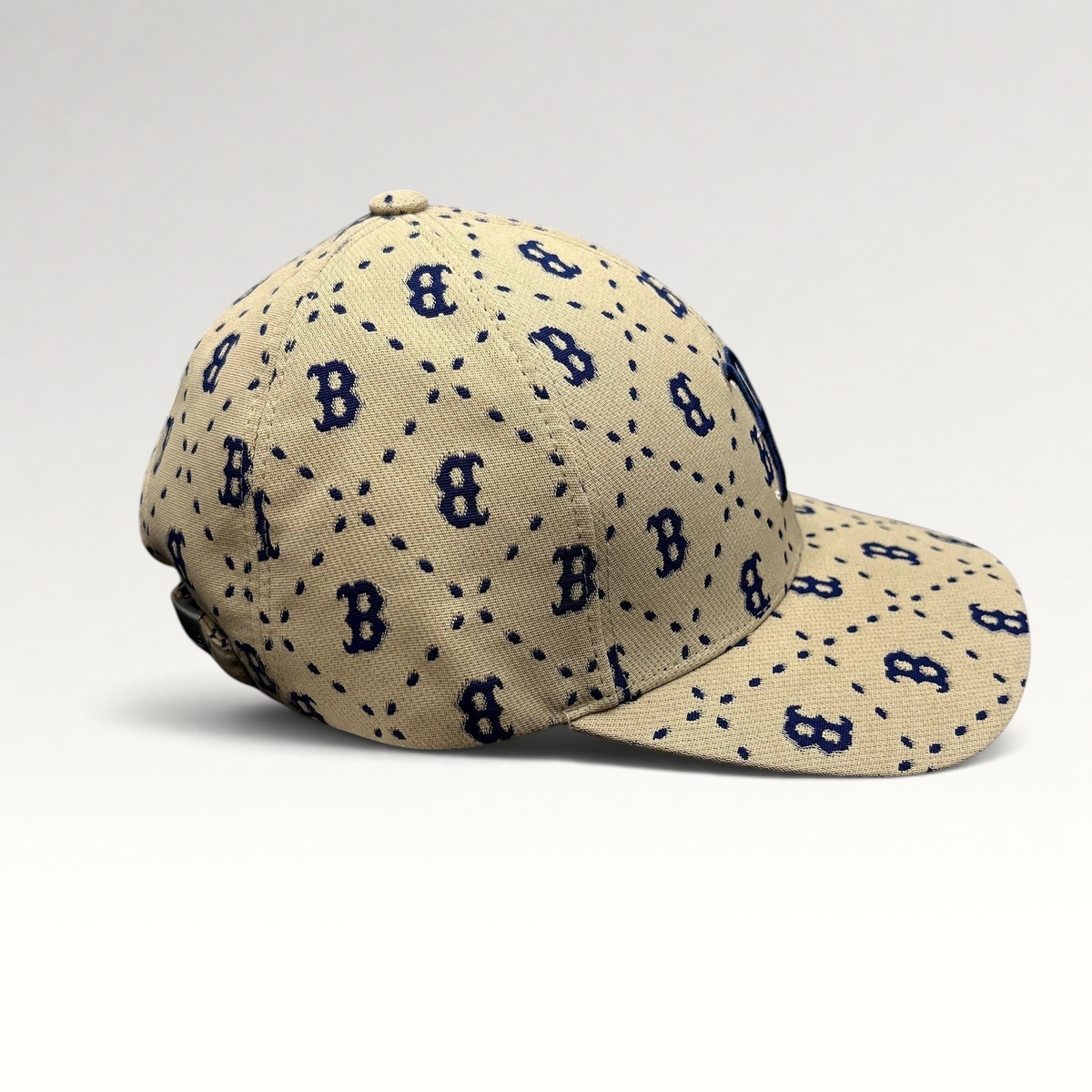 Raree Finds MLB Korea Boston Red Sox strapback hat in beige canvas with a blue monogram B pattern and curved brim.