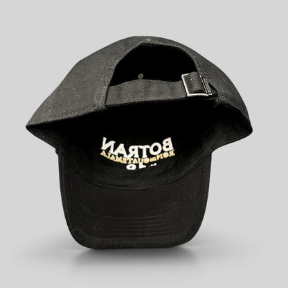 Raree Finds black cotton strapback hat with Botran Ron de Guatemala No. 18 embroidery on the interior brim