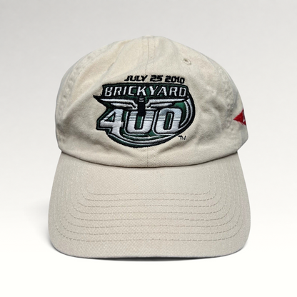 Raree Finds cream cotton 2010 Brickyard 400 NASCAR strapback hat with embroidered event logo and date