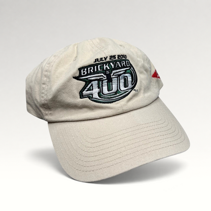 Raree Finds cream cotton 2010 Brickyard 400 NASCAR strapback hat with embroidered event logo and Budweiser side detail