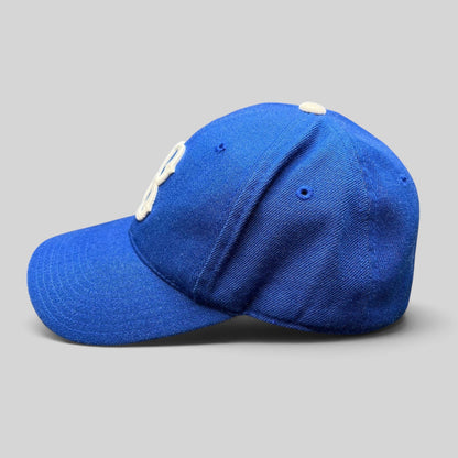 Raree Finds vintage Brooklyn Dodgers wool blend fitted hat in royal blue with white embroidered B logo, side view.