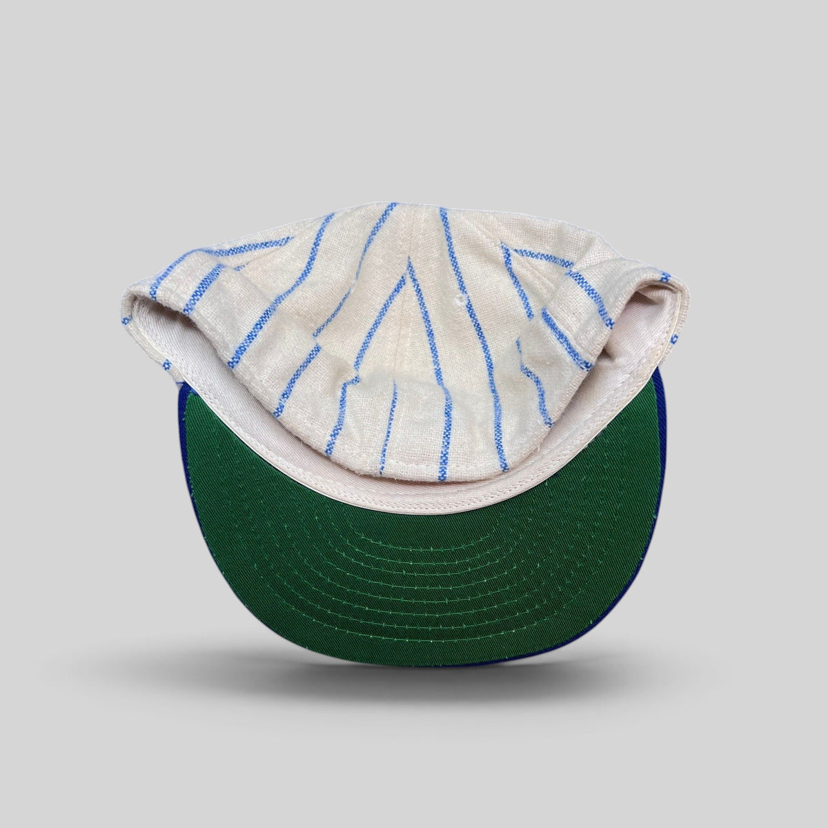 Raree Finds vintage Brooklyn Dodgers pinstripe wool cap with a classic green underbrim and royal blue brim.