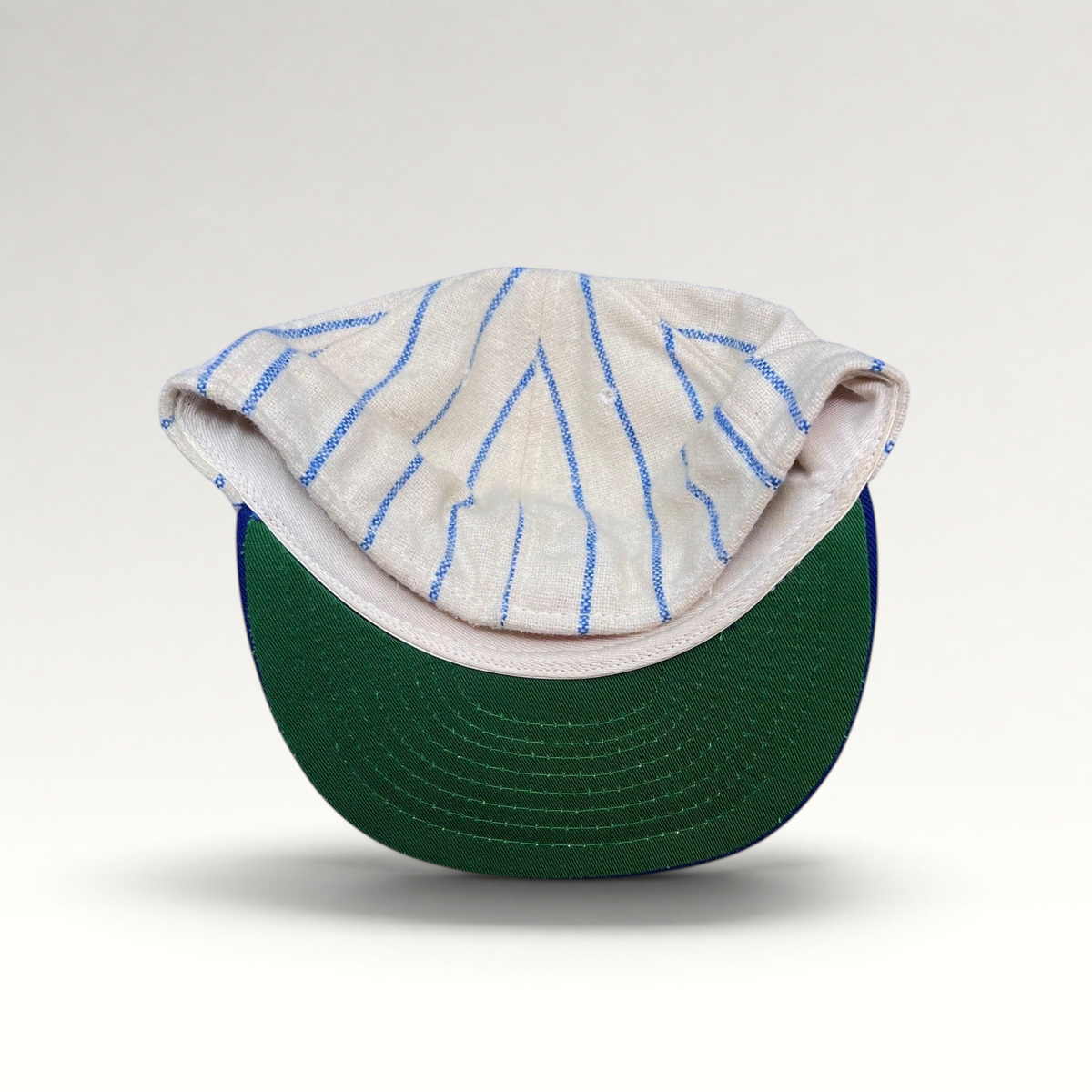 Raree Finds vintage Brooklyn Dodgers pinstripe wool cap with a classic green underbrim and royal blue brim.