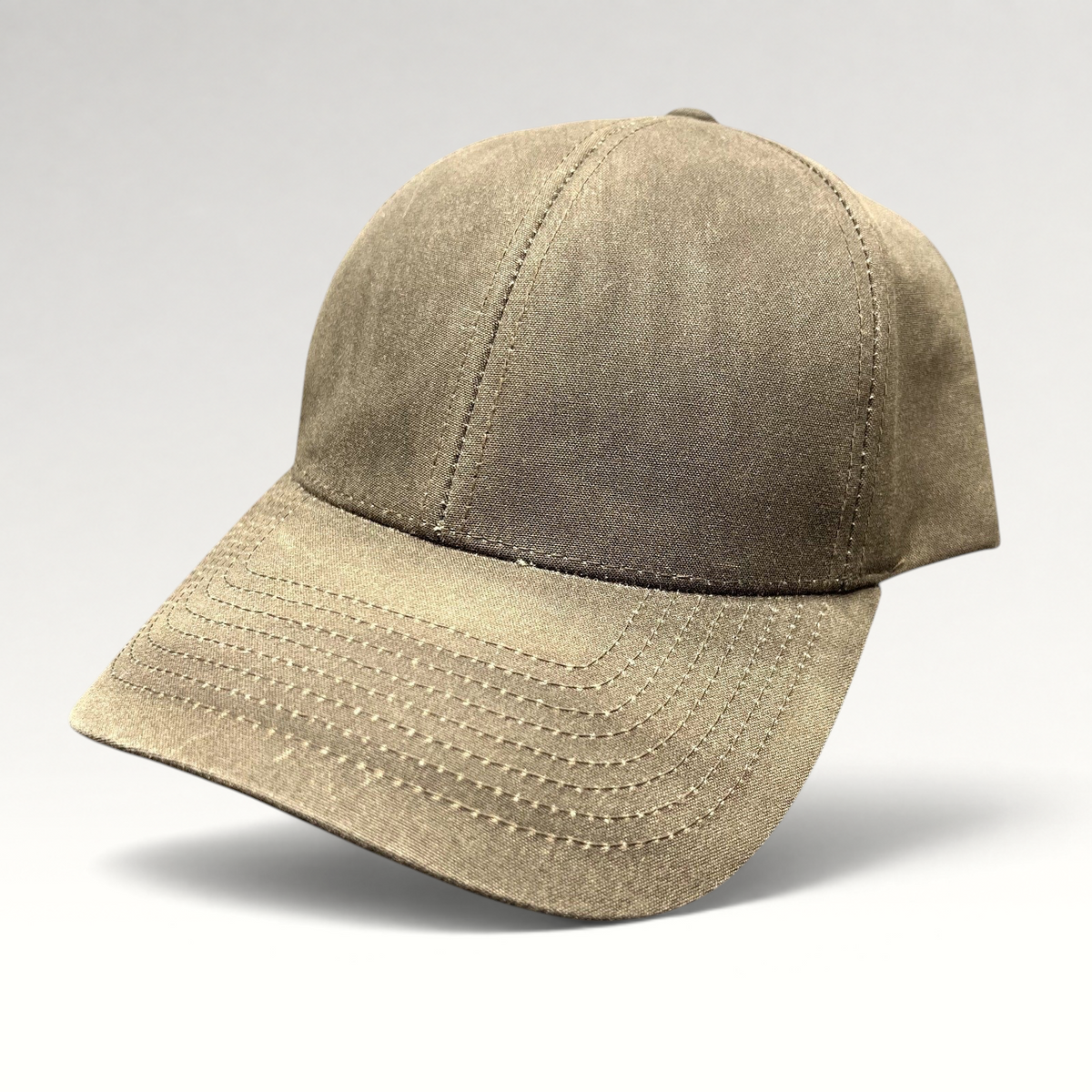 Raree Finds brown minimalist Varsity Headwear strapback cap with a structured crown and curved brim.