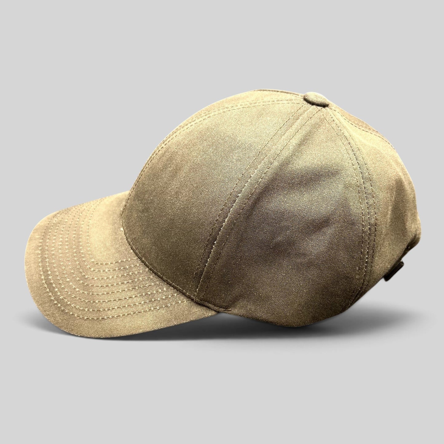 Raree Finds brown minimalist strapback hat with a structured crown and curved brim in a clean designer style.