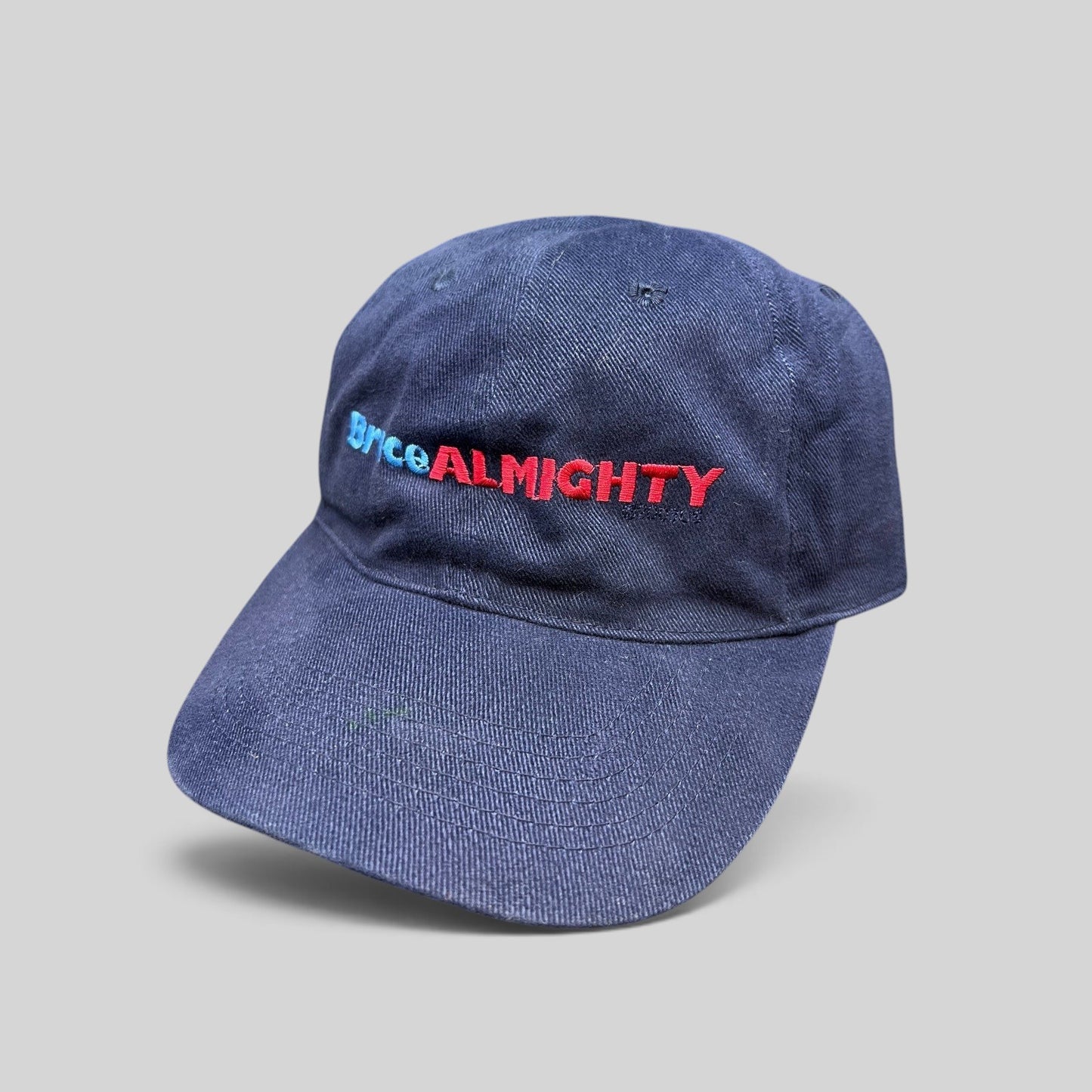 Raree Finds vintage 2003 Bruce Almighty navy blue cotton dad cap with embroidered red and blue movie logo