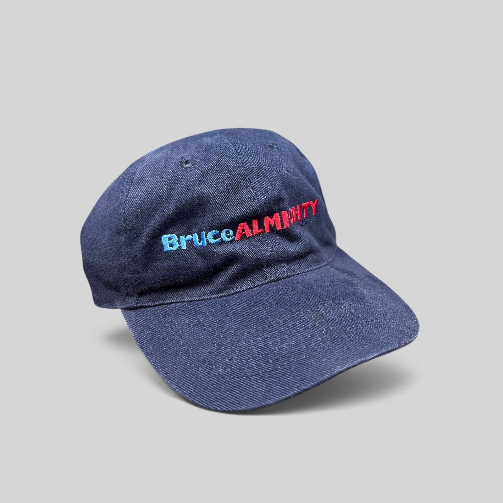 Raree Finds vintage 2003 Bruce Almighty navy blue cotton dad cap with embroidered red and blue movie logo