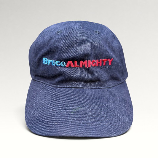 Raree Finds vintage 2003 Bruce Almighty navy blue cotton dad cap with embroidered two-tone logo and brass strapback.