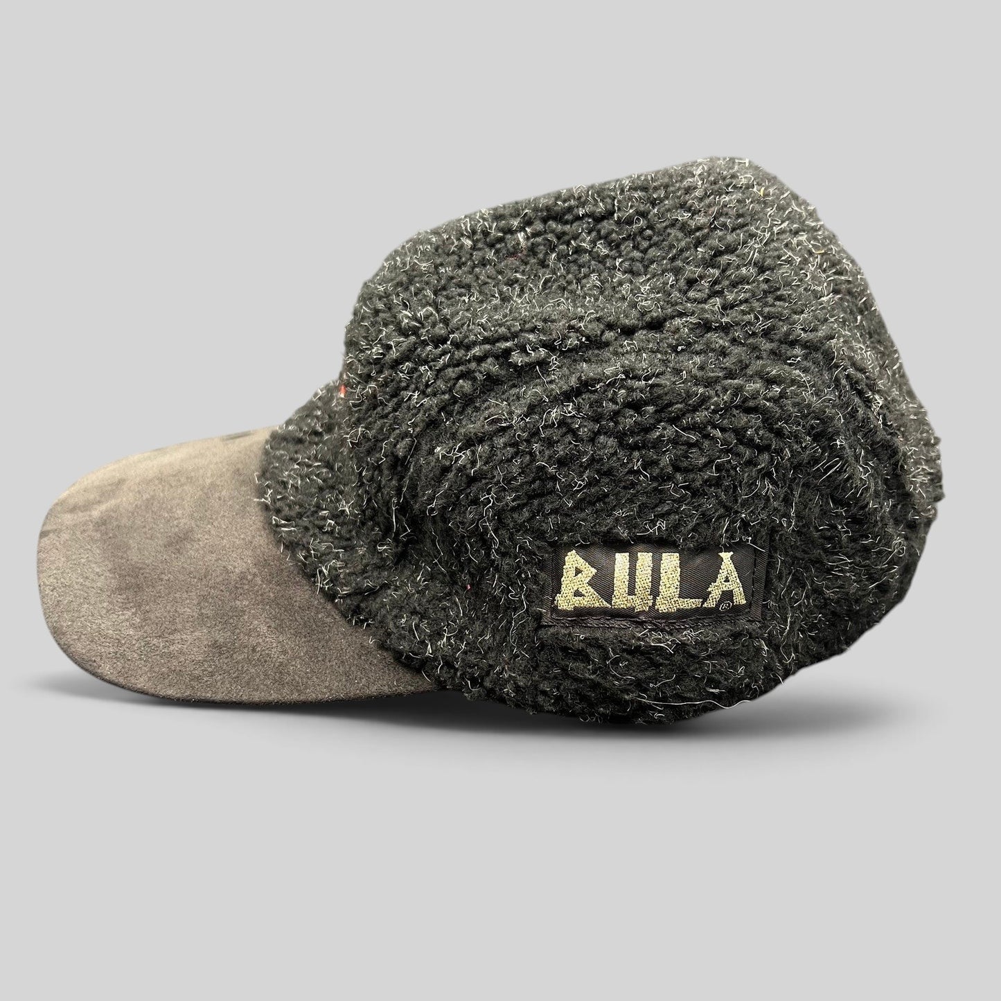 Raree Finds vintage BULA black sherpa fleece strapback hat with a charcoal suede brim and USA Ski Team patch