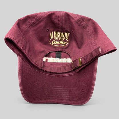 Raree Finds burgundy strapback hat with gold Al Bronzo Barilla embroidery on the back and adjustable metal buckle