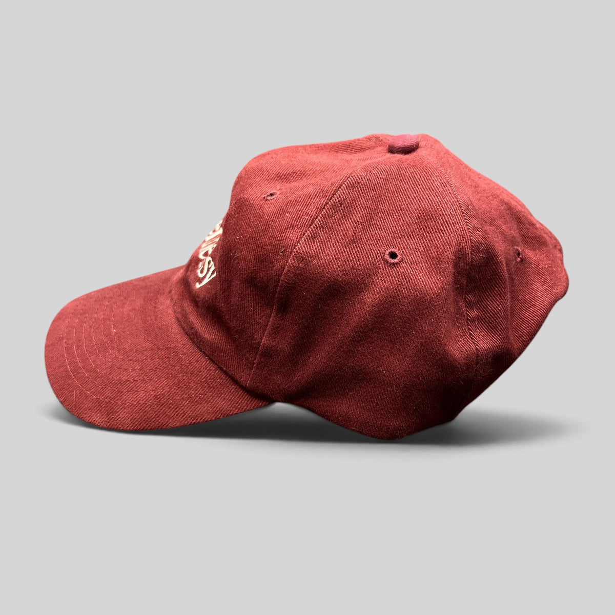 Raree Finds vintage burgundy cotton Hennessy Cognac dad cap with embroidered logo and side profile view