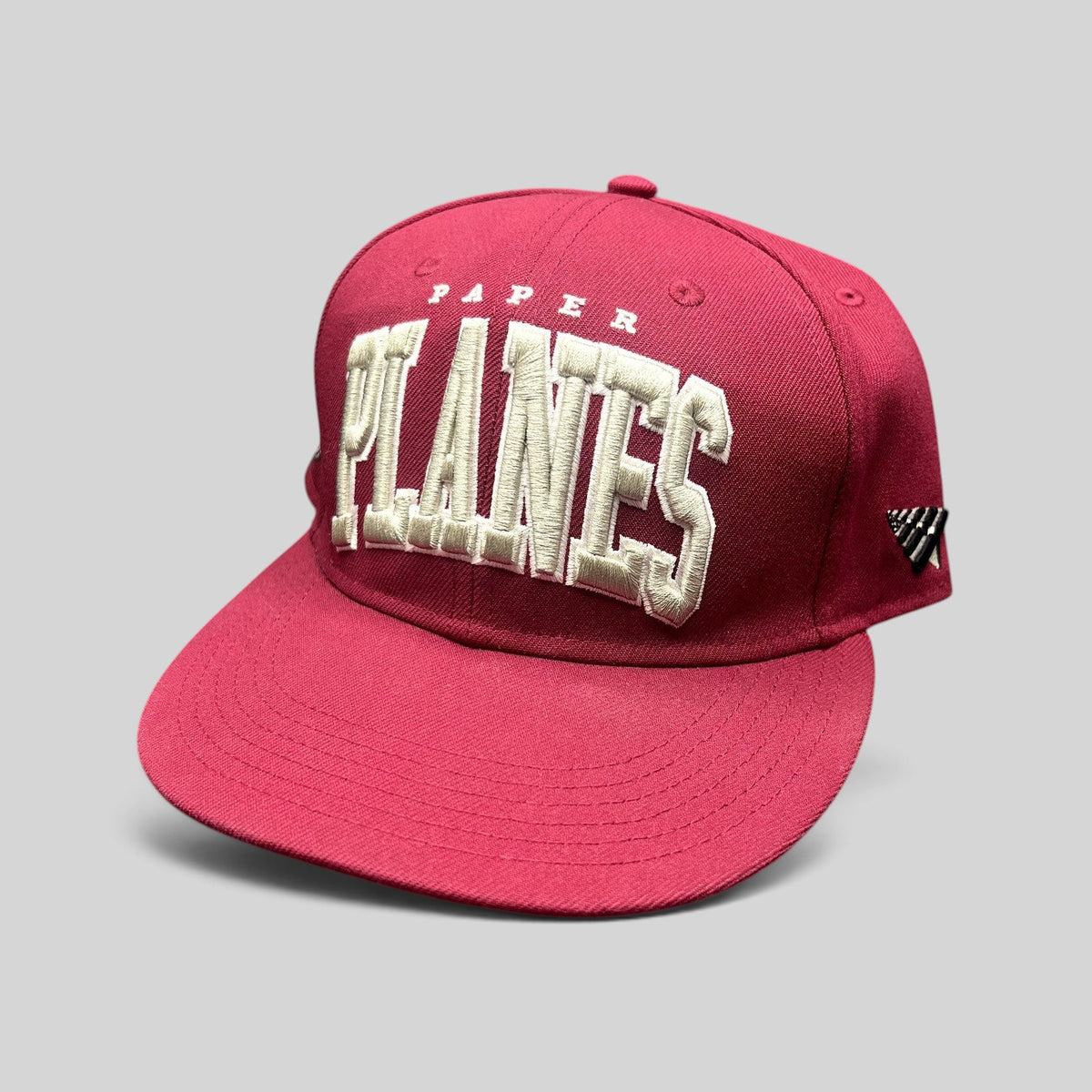Raree Finds burgundy Paper Planes fitted hat with raised 3D white PLANES embroidery and side logo patch