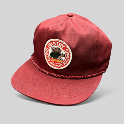Raree Finds vintage burgundy snapback trucker hat with braided rope brim and Rapid Delivery Service patch