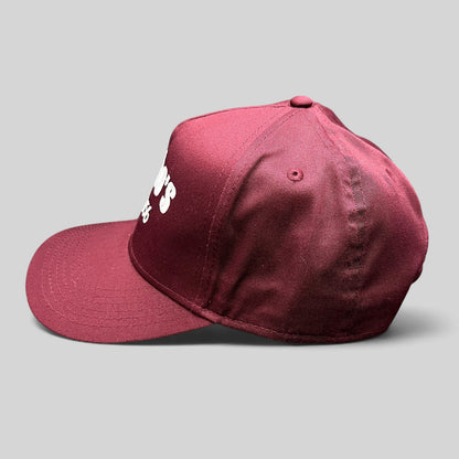 Raree Finds burgundy Otto Cap snapback hat with white Santoro’s Since 1956 embroidery, side profile view.