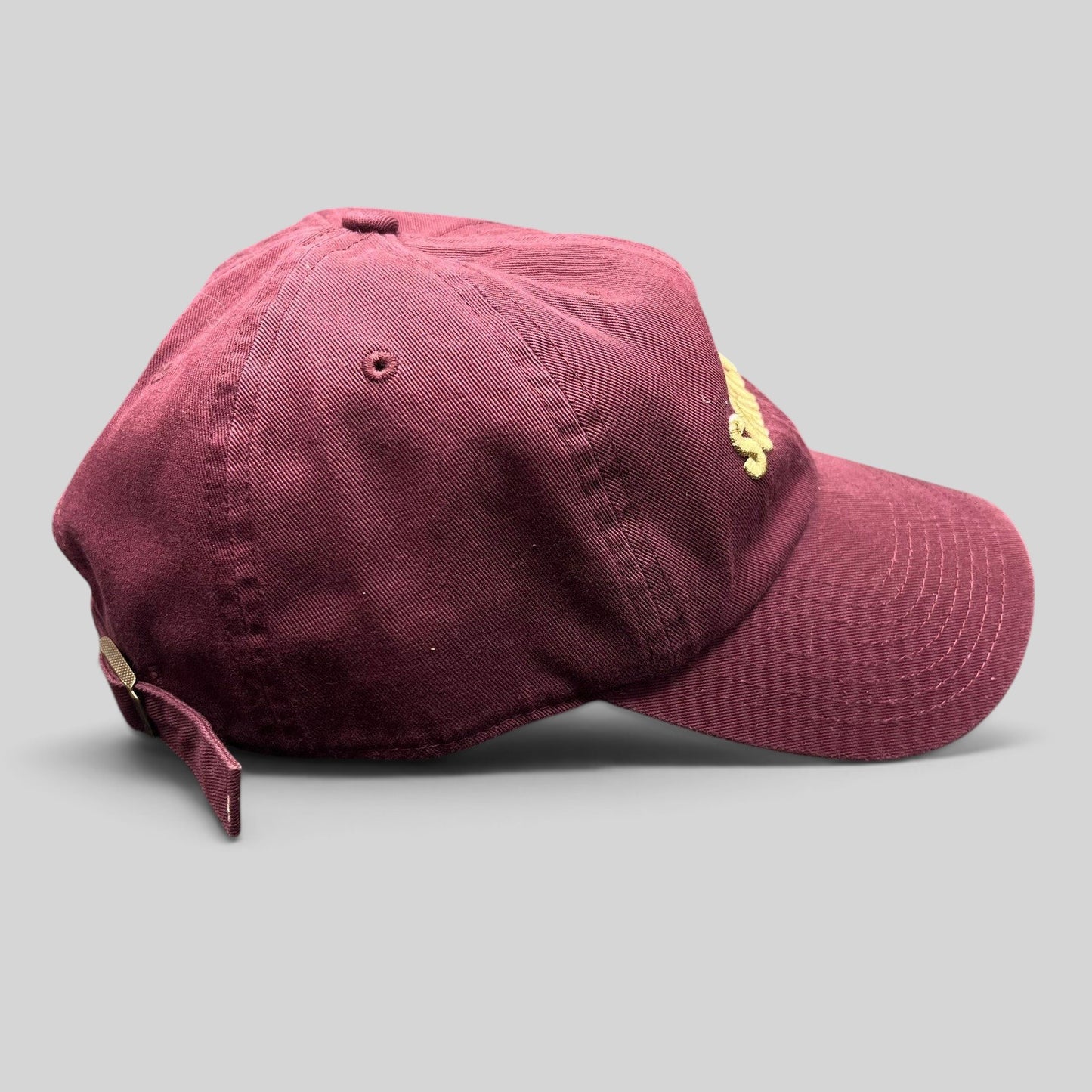 Raree Finds burgundy strapback hat with Scarpetta embroidered in gold on the front and Al Bronzo Barilla on the back.