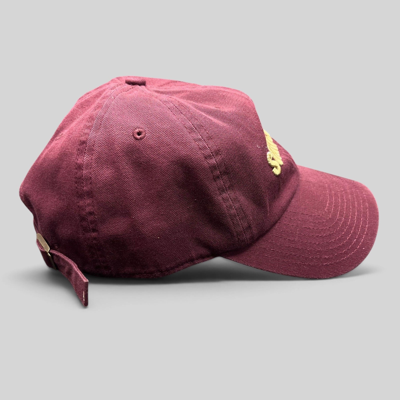 Raree Finds burgundy strapback hat with Scarpetta embroidered in gold on the front and Al Bronzo Barilla on the back.