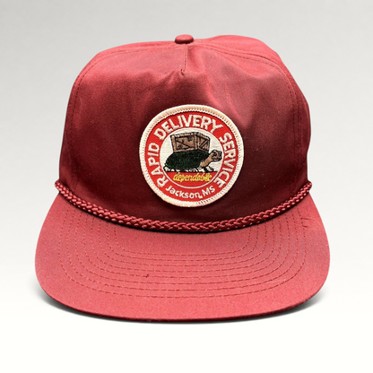 Raree Finds vintage burgundy trucker hat with braided rope brim and Rapid Delivery Service embroidered patch