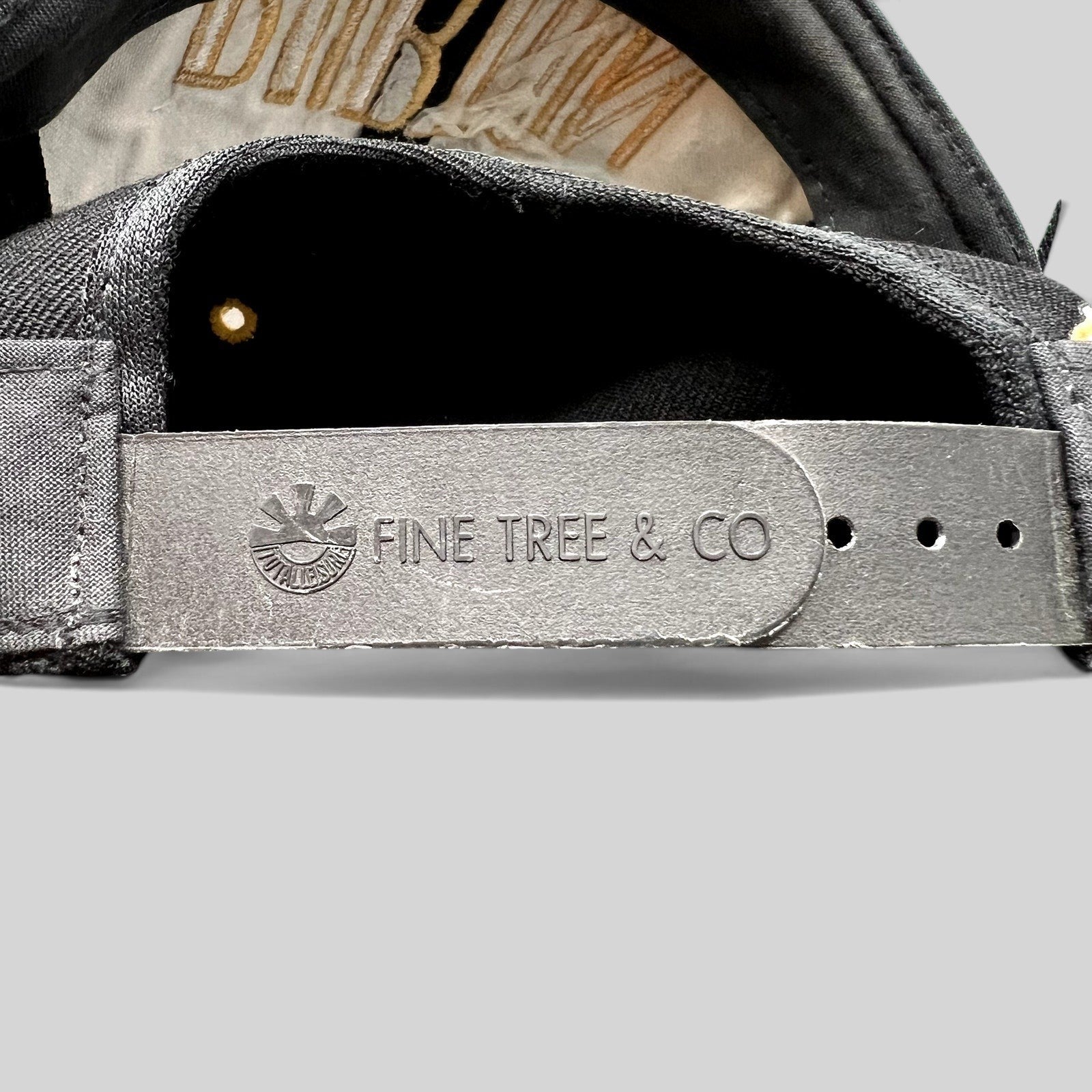 Raree Finds vintage Burton Snowboards snapback hat featuring a premium black leather snap closure by Fine Tree & Co.